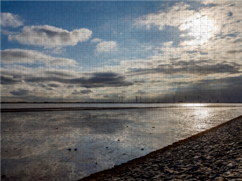 Wolken über dem Dollart in Ostfriesland