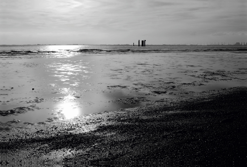 Sonnenstrahlen im Wattenmeer