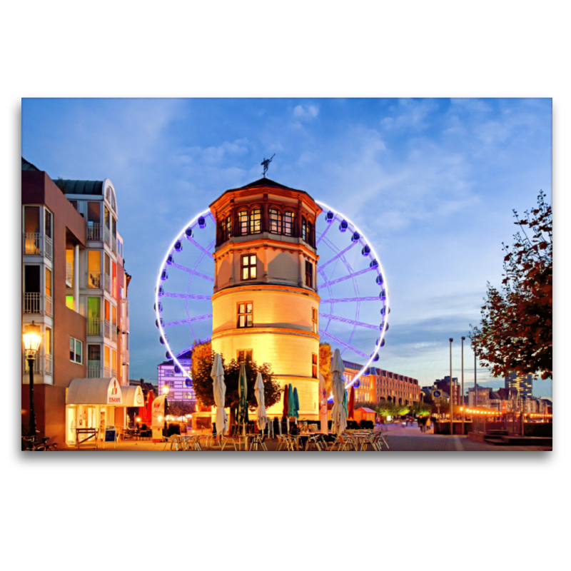 Schlossturm mit Riesenrad zur blauen Stunde am Morgen