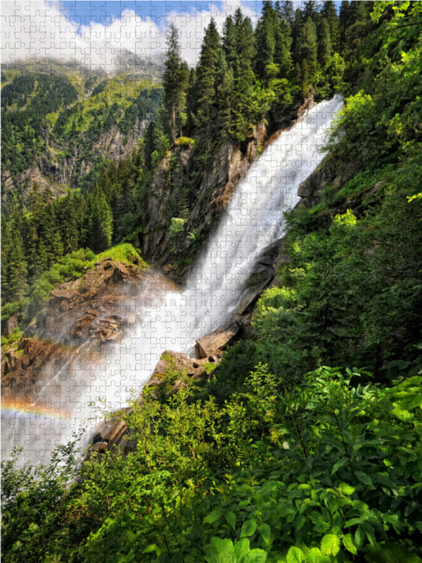 Krimmler Wasserfall mit Regenbogen. Hohe Tauern im Salzburger Land Österreich.