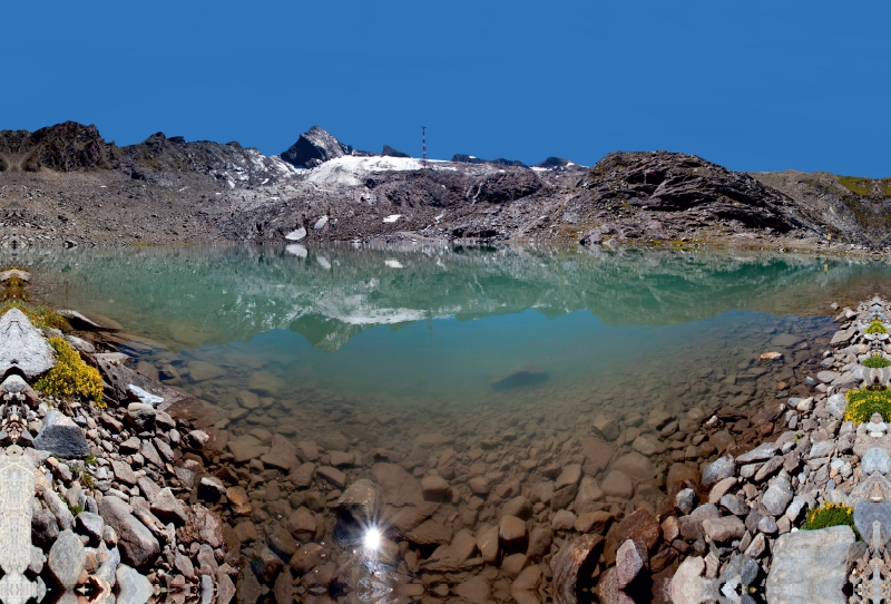 Das Kitzsteinhorn spiegelt sich im Gletschersee