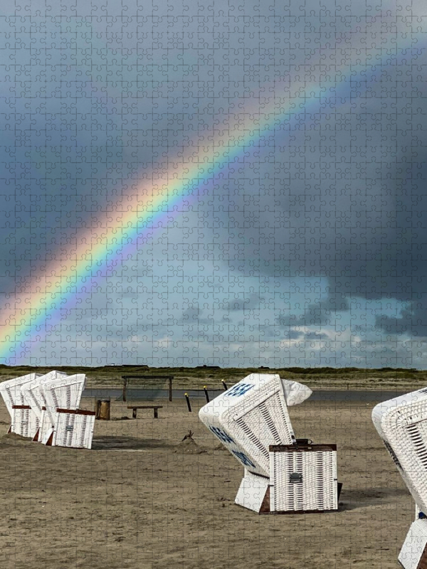 Regenbogen nach Gewitterstimmung am Strand von Sankt Peter-Ording