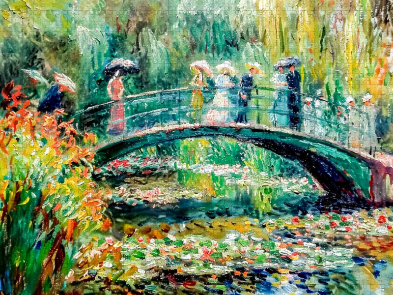 Impressionistische Brücke mit Menschen über dem Seerosenteich