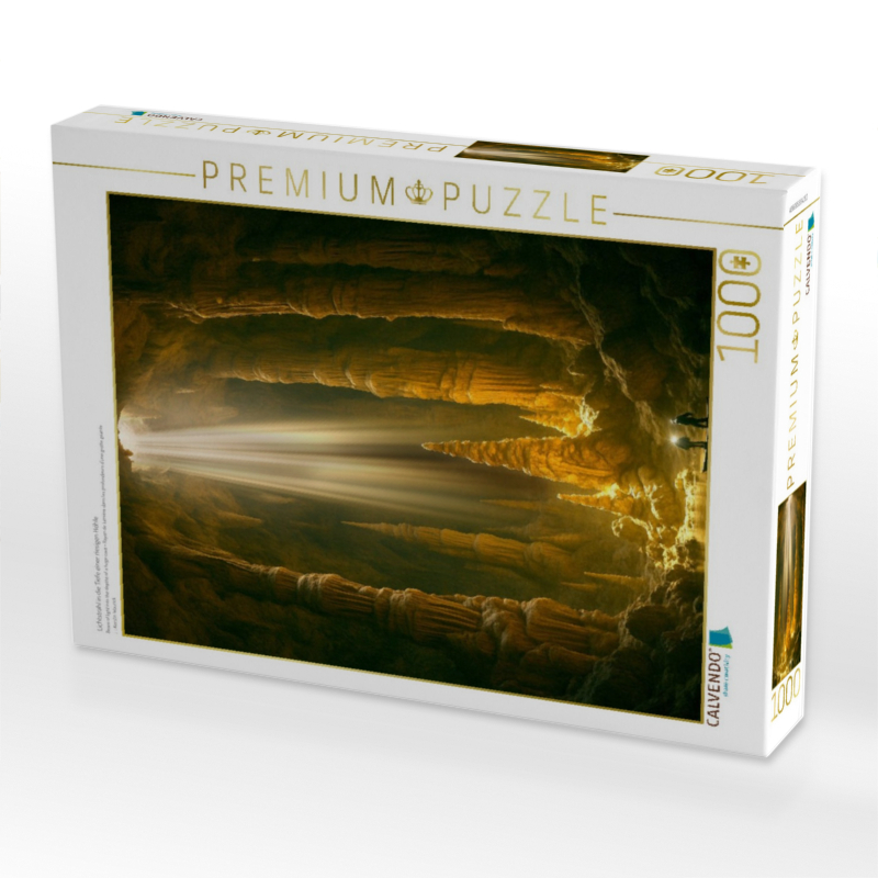 Lichtstrahl in die Tiefe einer riesigen Höhle