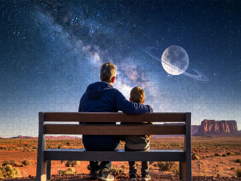 Ein Vater und sein Sohn betrachten einen fremdartigen Sternenhimmel