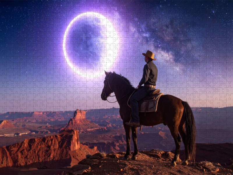 Cowboy auf Pferd im Mondlicht