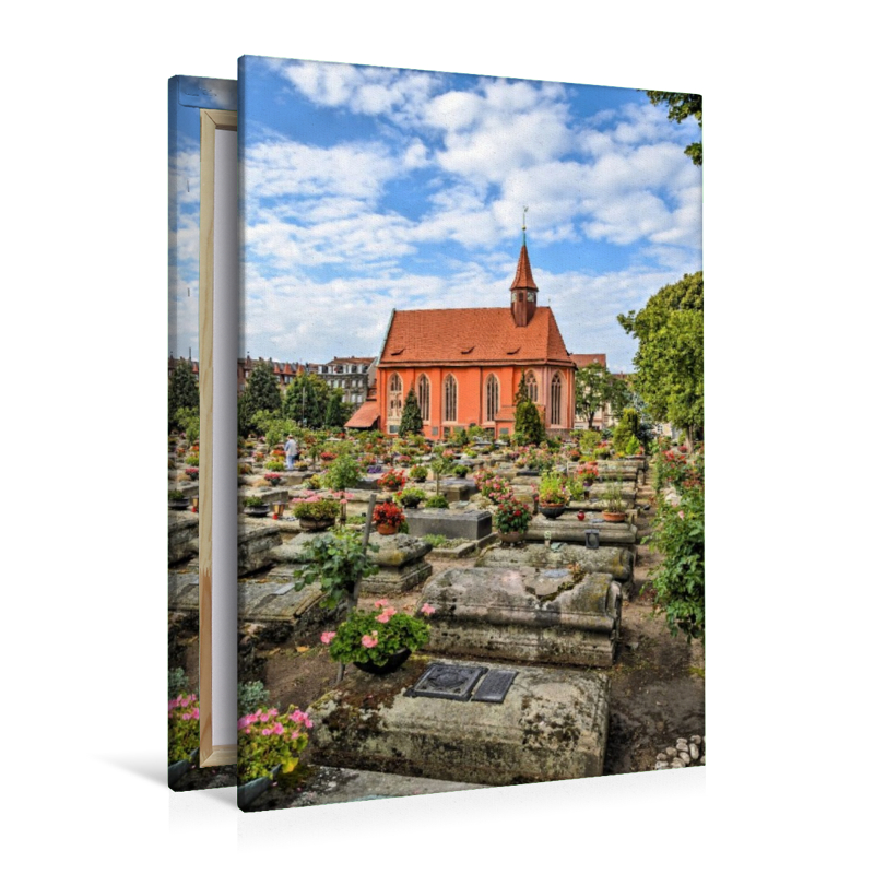 Johannisfriedhof mit historischen Grabsteinen und der aus dem13. Jahrhundert stammenden St.-Johannis-Kirche in Nürnberg, Bayern