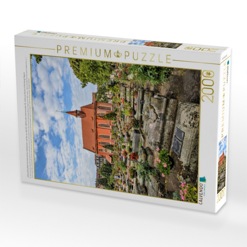 Johannisfriedhof mit historischen Grabsteinen und der aus dem13. Jahrhundert stammenden St.-Johannis-Kirche in Nürnberg, Bayern