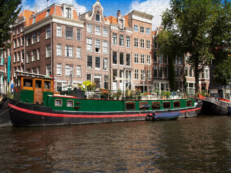 Typisches Hausboot in der Herrengracht, Amsterdam