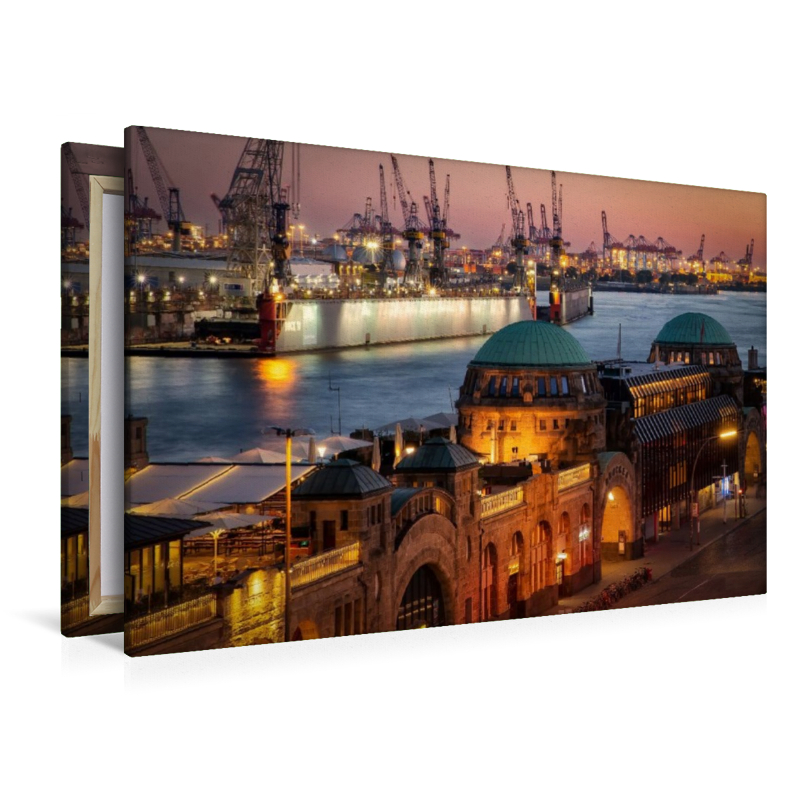 Historische Landungsbrücken und Hafenkräne an der Elbe